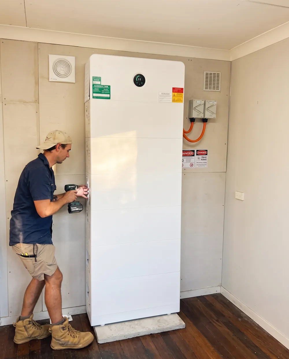 Solar Start installer fitting a home battery
